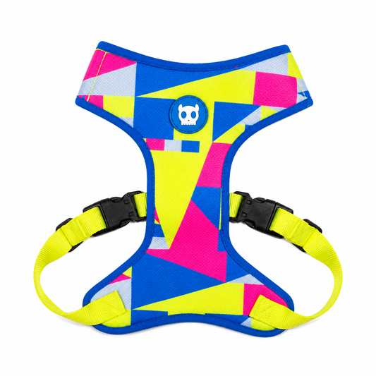 Arnés Zeedog Mesh Plus Volt con patrón geométrico en amarillo neón, azul y rosado