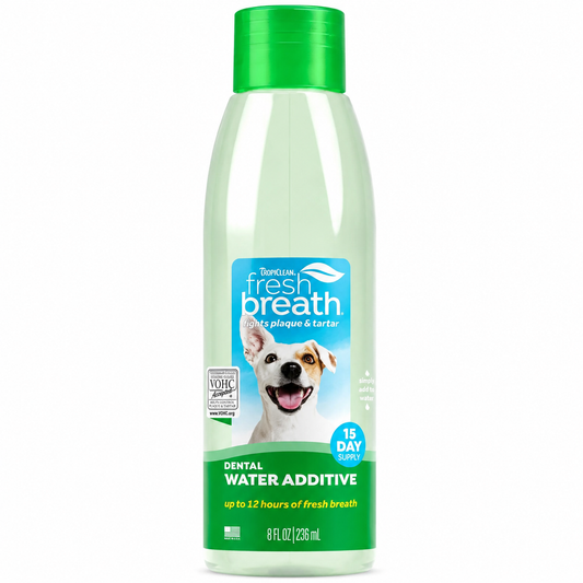 Botella verde de aditivo dental TropiClean Fresh Breath 473 ml para el agua de los perros